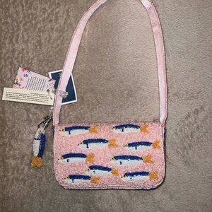 ✅VIRAL PINK SARDINES WITH CHARM  beaded bag.